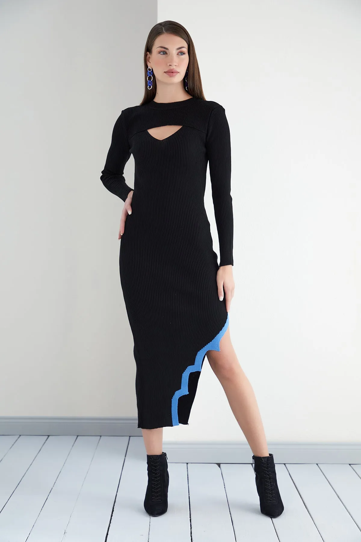 Edgy Noir Cut Sleeve Knit with Asymmetric Slit