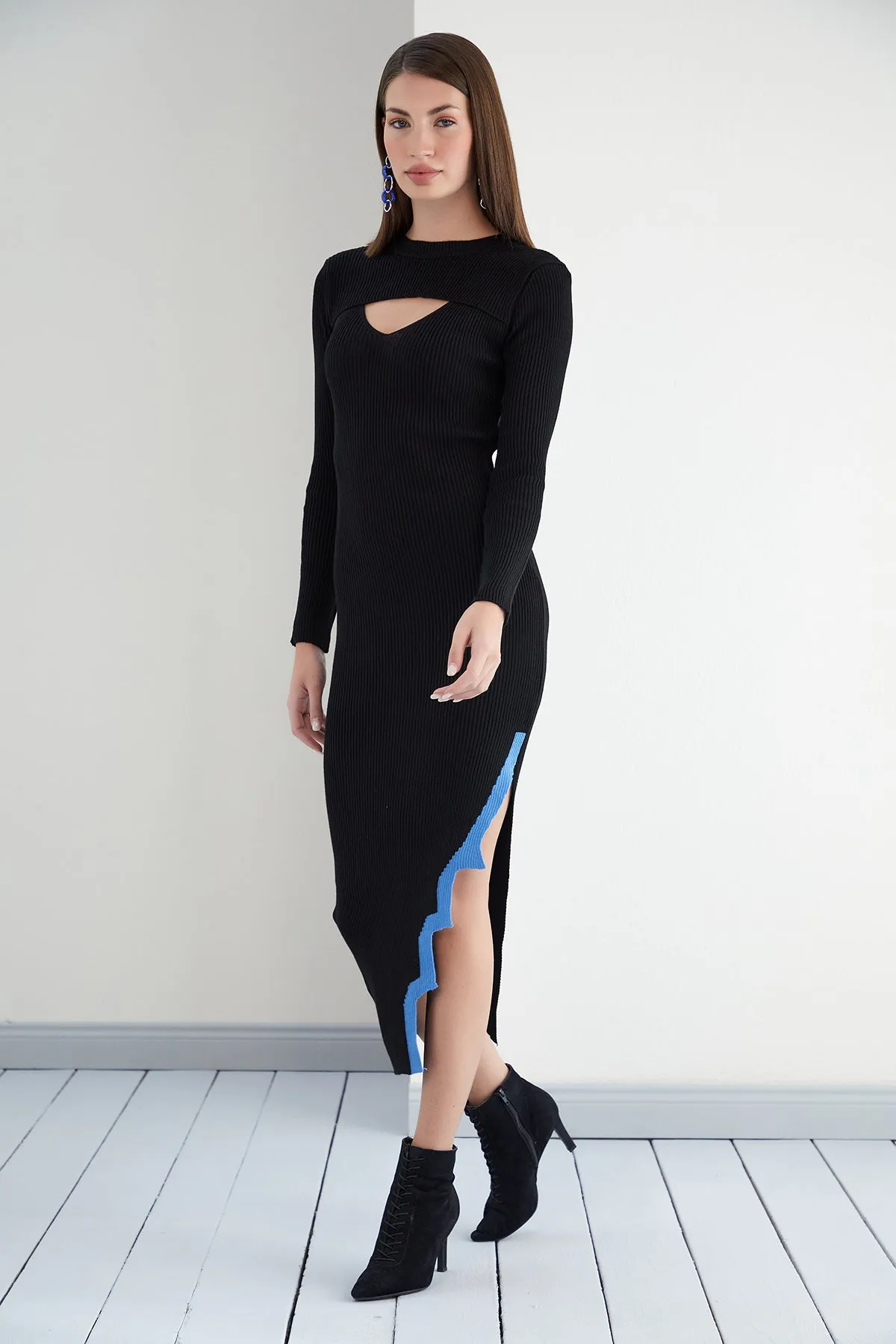 Edgy Noir Cut Sleeve Knit with Asymmetric Slit