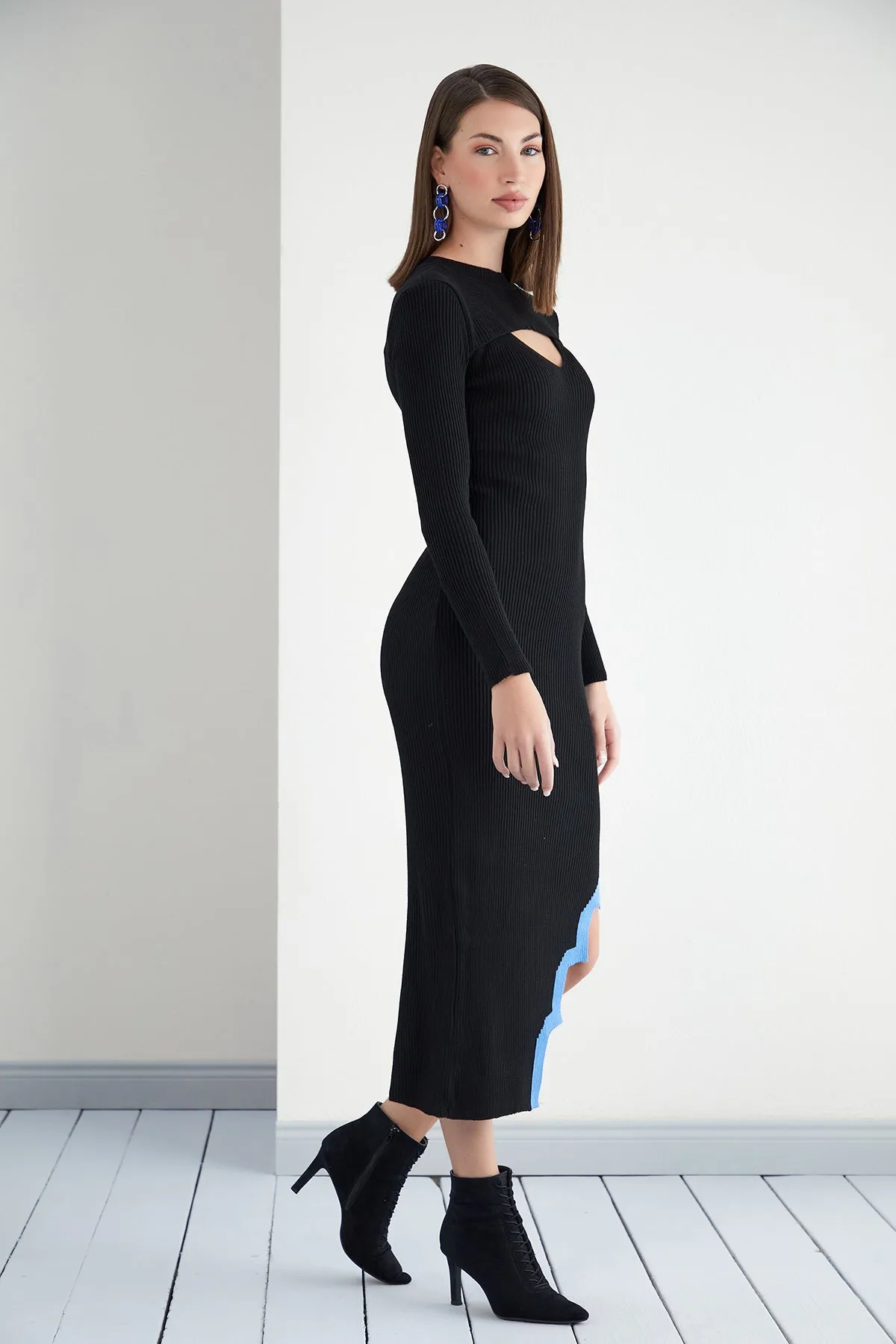 Edgy Noir Cut Sleeve Knit with Asymmetric Slit